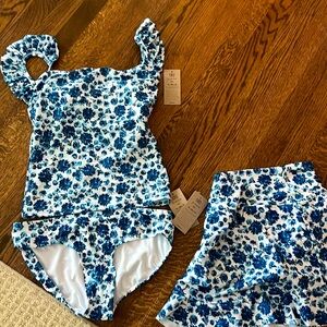 Albion bathing suit never worn or even tried on. Comes with a skirt.